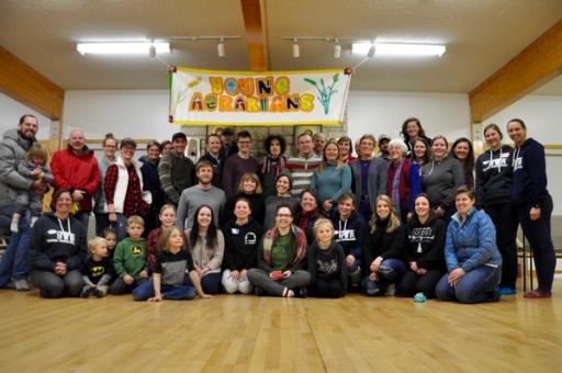 Young Agrarians pose for a photo in a gym