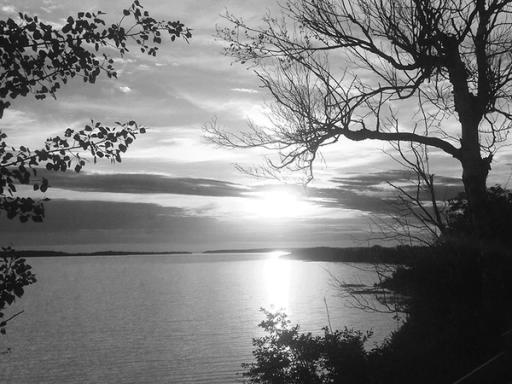 Black & white photograph of Lac La Biche at sunset