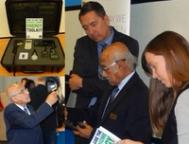 A collage of three images displaying people testing out a box of tools labeled 'Green Home Energy Toolkit'