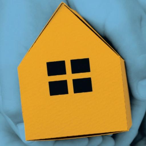 A folded yellow cardboard house sits in a pair of hands