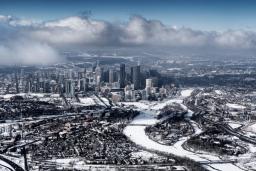 Winter aerial view of Calgary city center from the distance