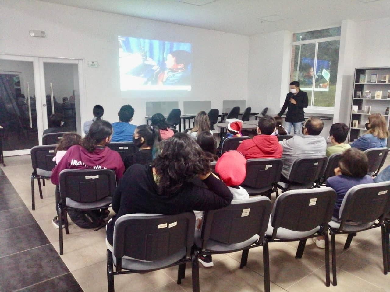 The educator teaching GDevelop.