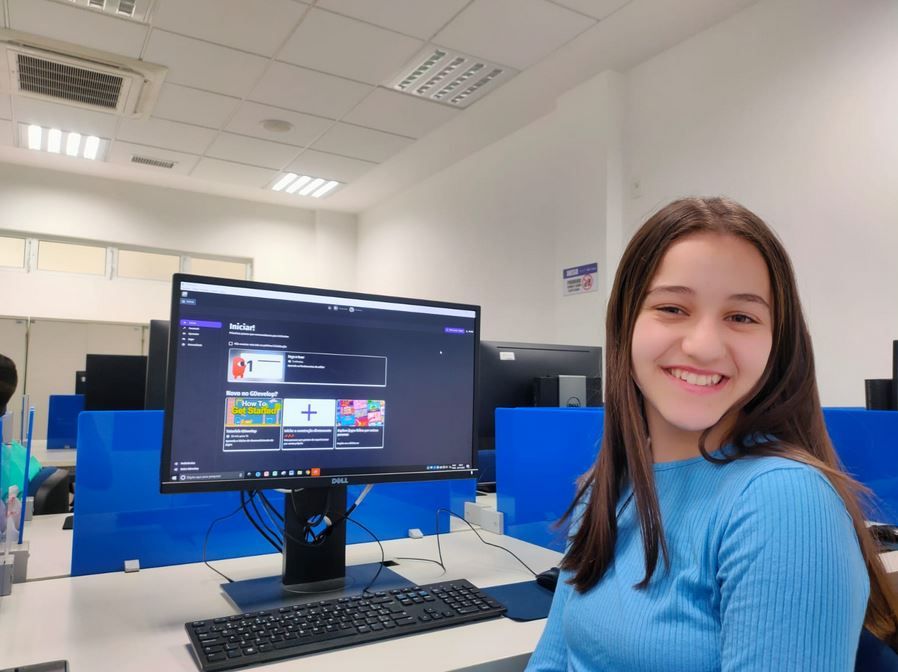 Happy student with her project.