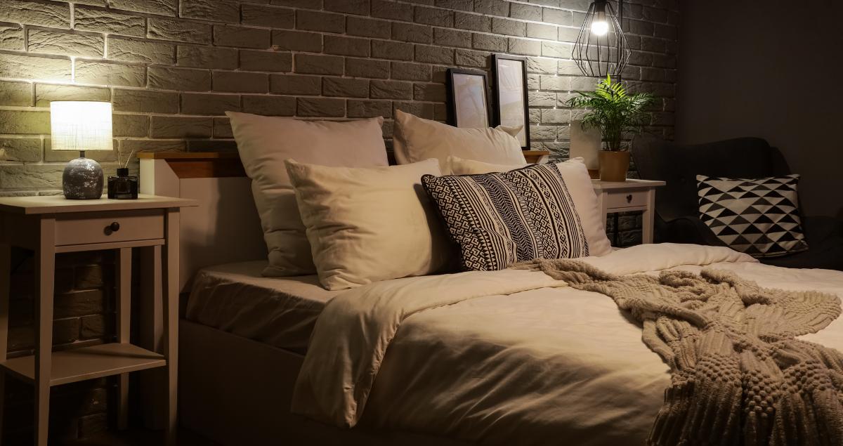 Cozy dimly lit bedroom in a military rental property designed for TDY guests considering pet-friendly stays through TDY Hero