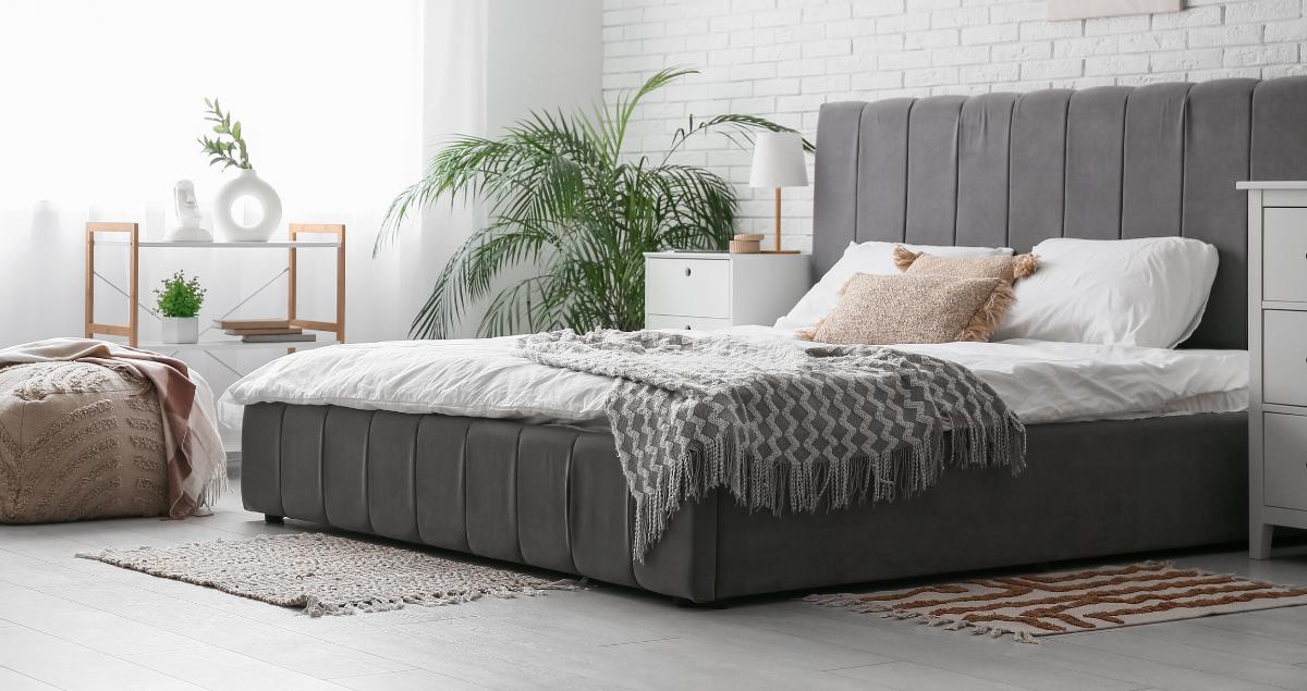 Cozy bedroom interior in a furnished TDY crashpad showing utility included living near Eglin AFB with TDY Hero