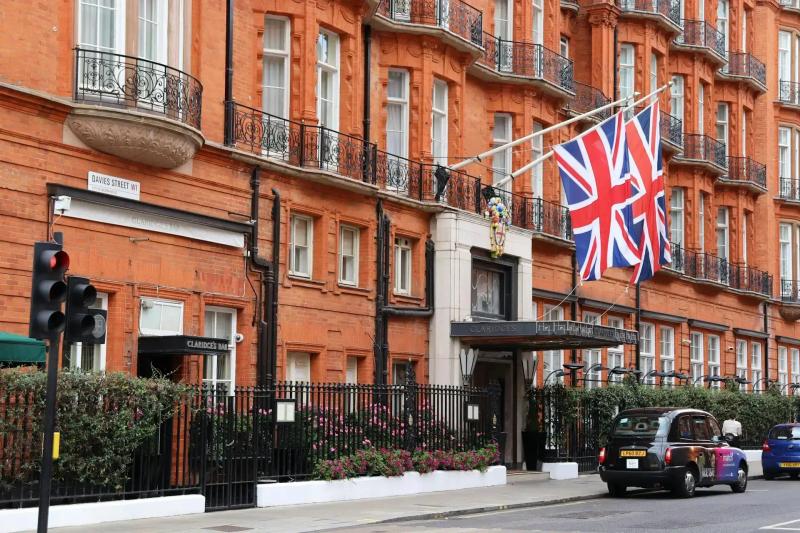 Claridges building in London with UK flags hanging outside