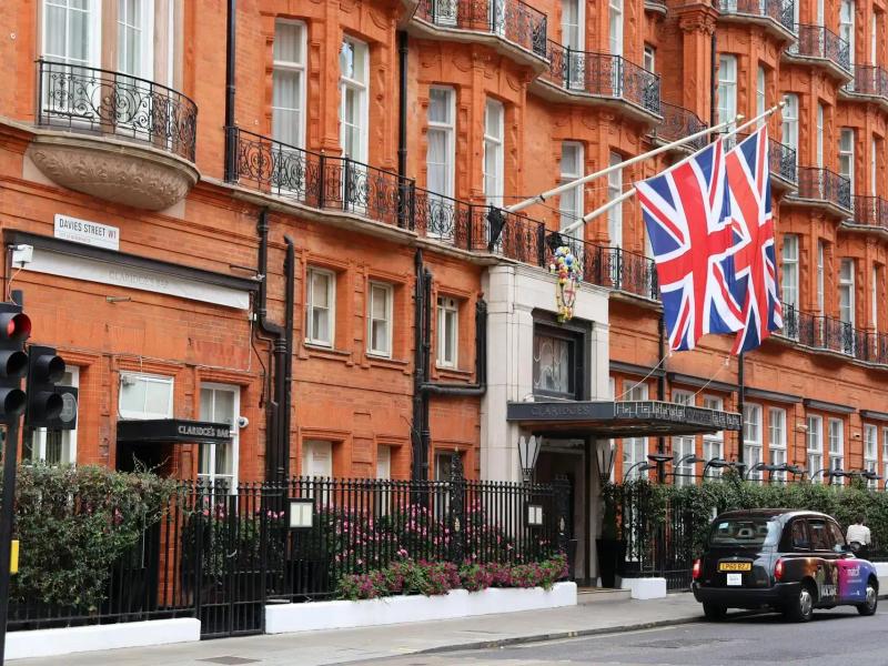Claridges building in London with UK flags hanging outside