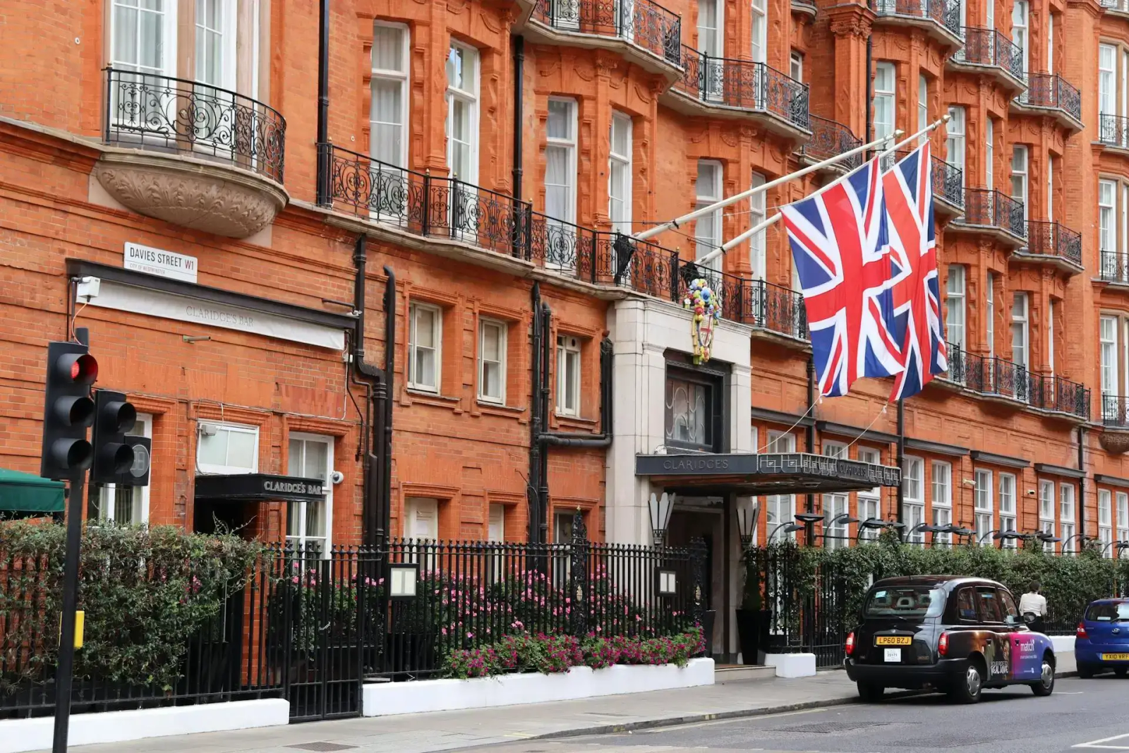 Claridges building in London with UK flags hanging outside