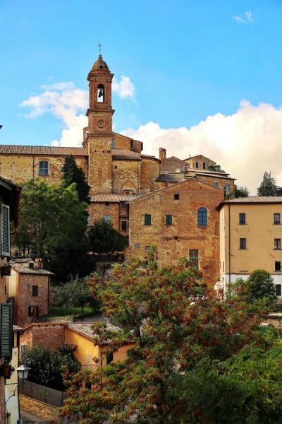 Medieval Italian architecture in Tuscany featuring traditional stone masonry and terracotta roofs