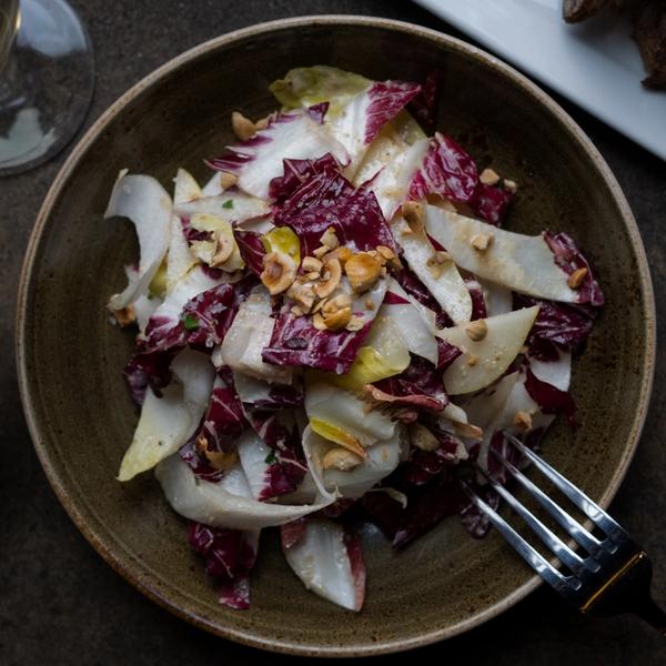 How to Cook a Wolf restaurant logo - View nutrition facts, calories, and macros for menu items at 2208 Queen Anne Ave N Seattle, WA 98109