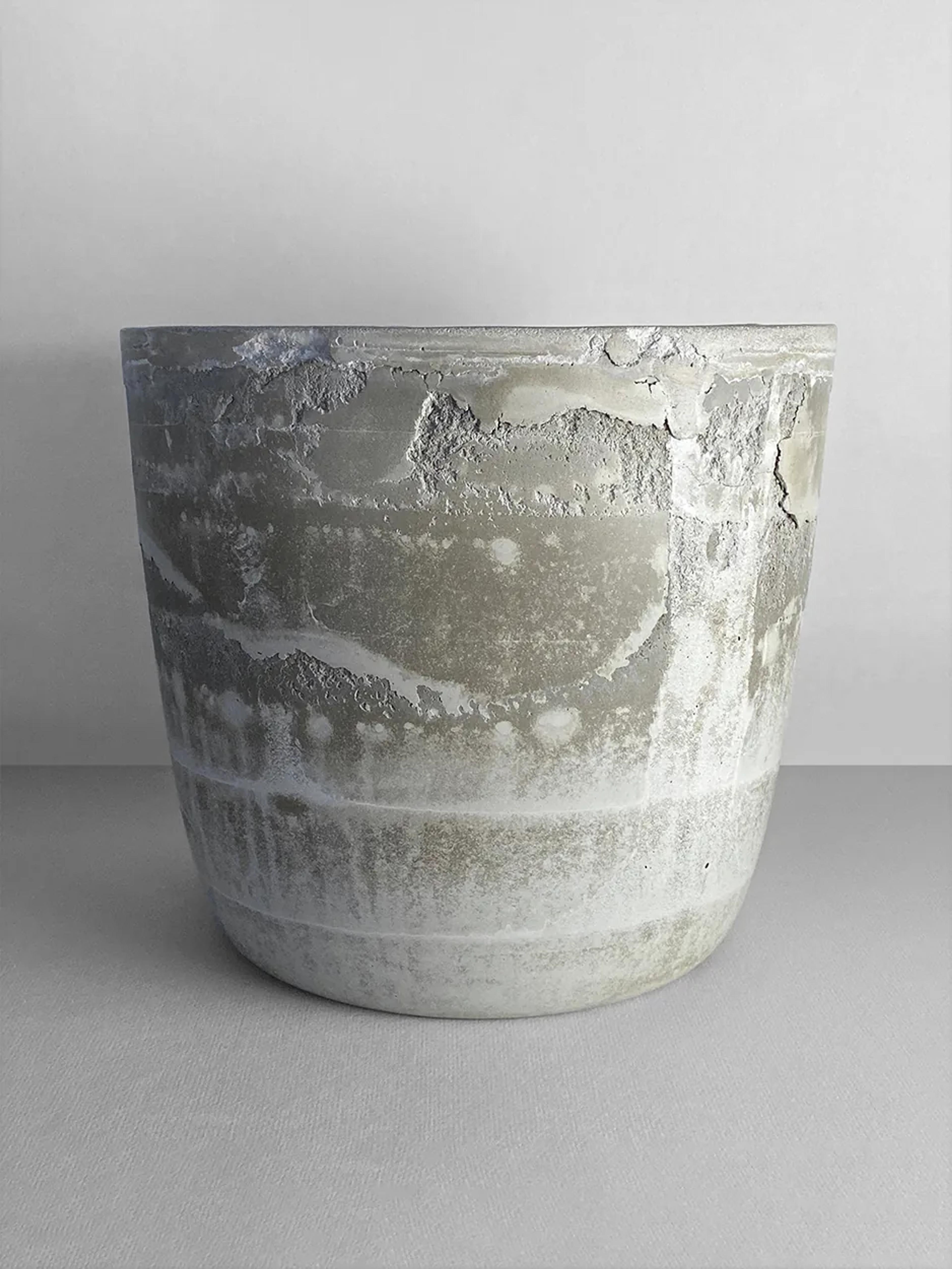 One Woman Army — a concrete planter, unplanted, view 1 of 2
