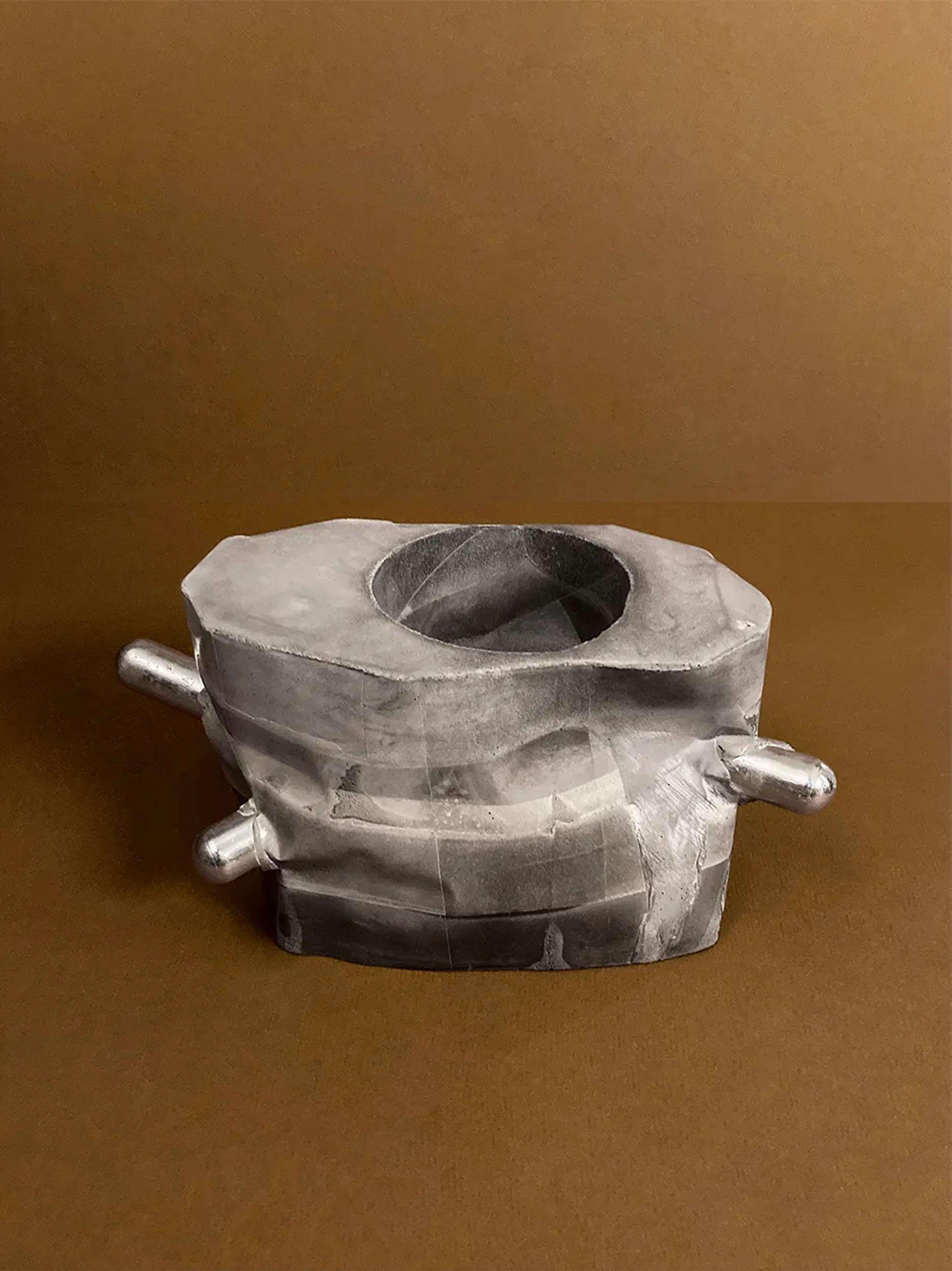 Right Angles — an octagonal concrete planter with two chrome rods, unplanted, view 1 of 4