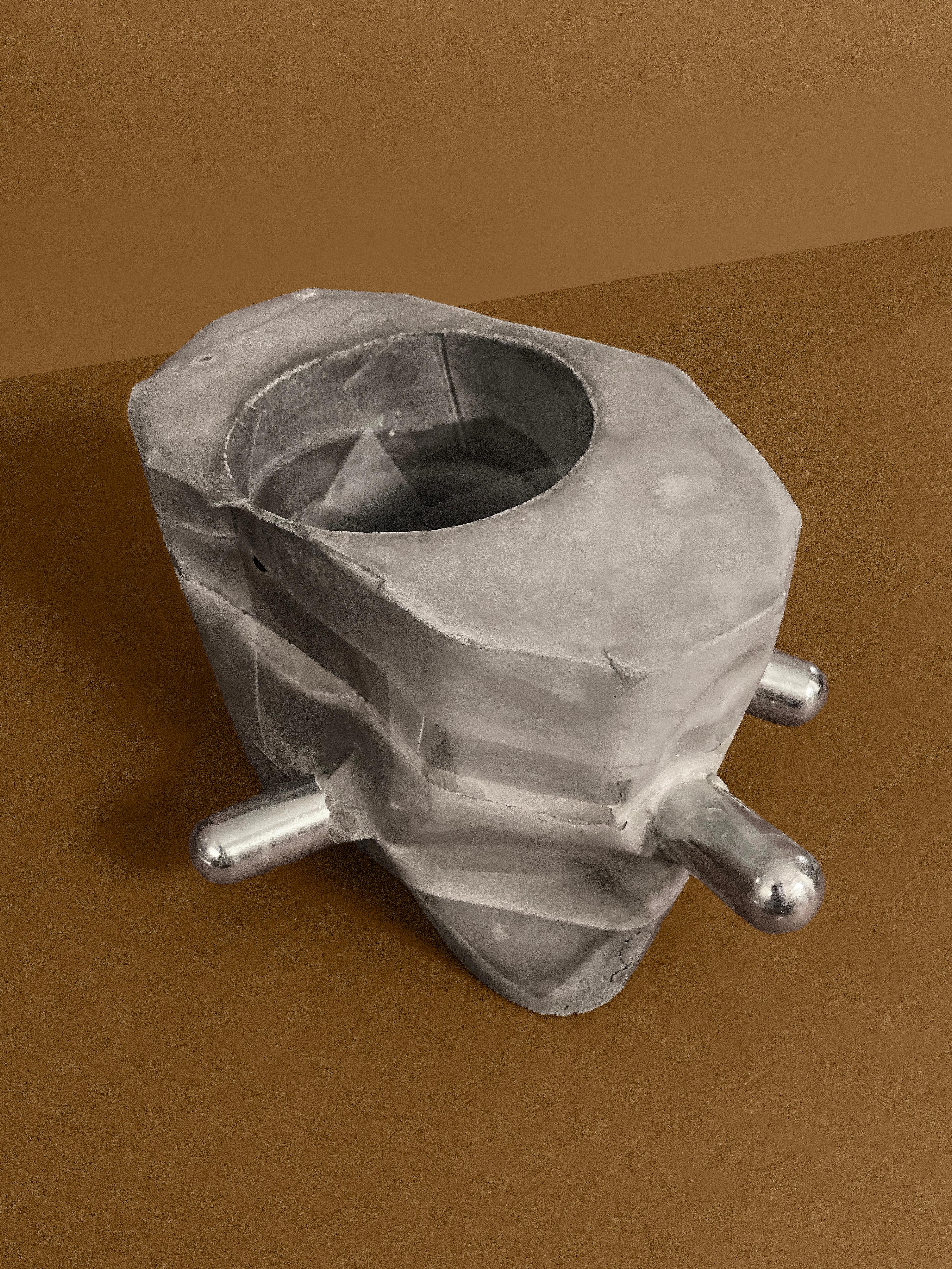 Right Angles — an octagonal concrete planter with two chrome rods, unplanted, view 2 of 4