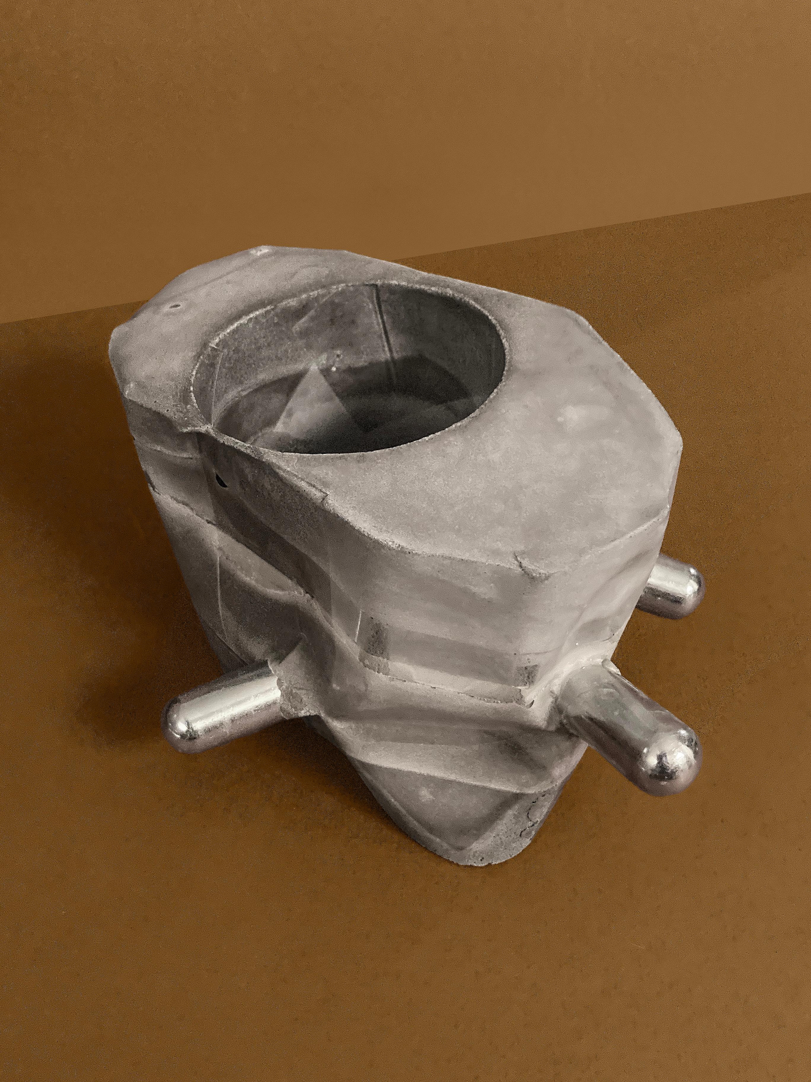 Right Angles — an octagonal concrete planter with two chrome rods, unplanted, view 2 of 5