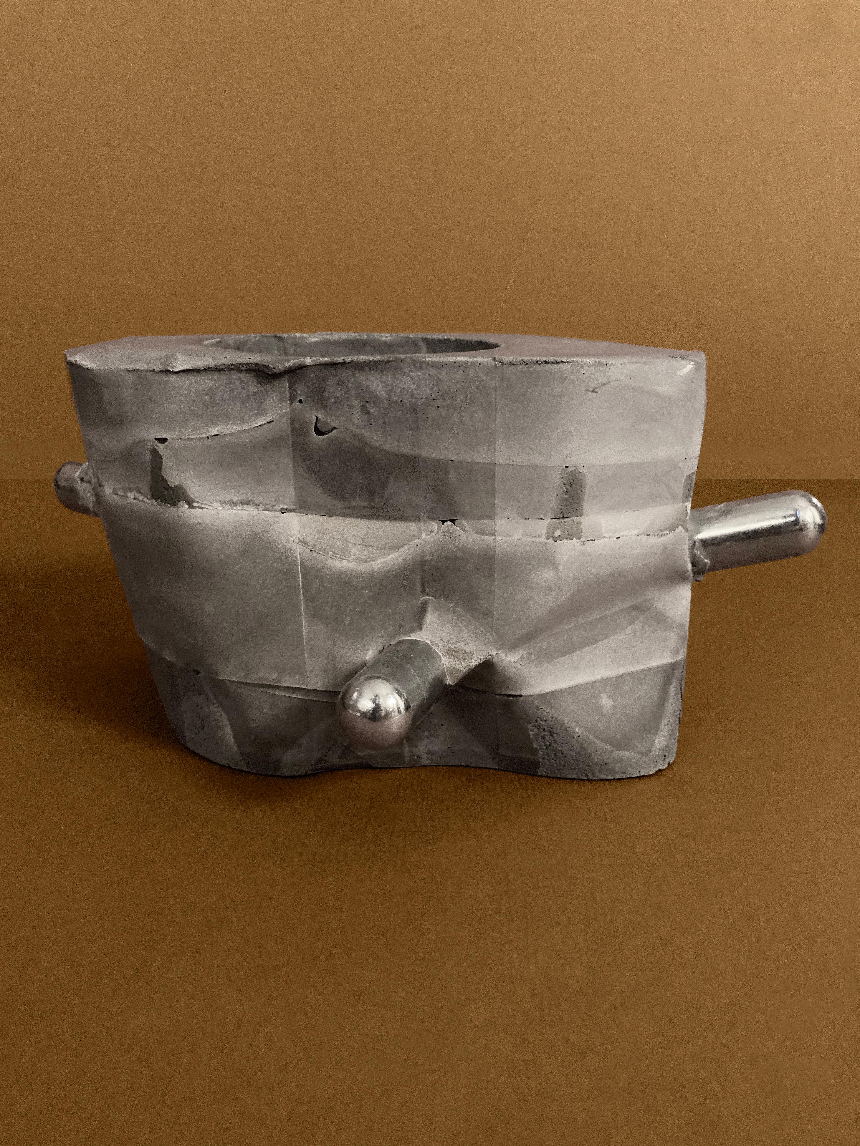 Right Angles — an octagonal concrete planter with two chrome rods, unplanted, view 3 of 5