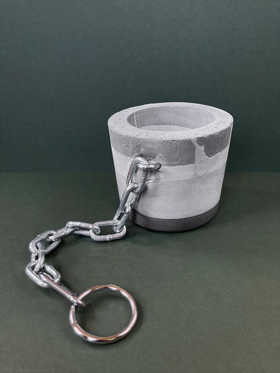 Anyone but You — a concrete planter with a chain and keyring, unplanted, view 1 of 2