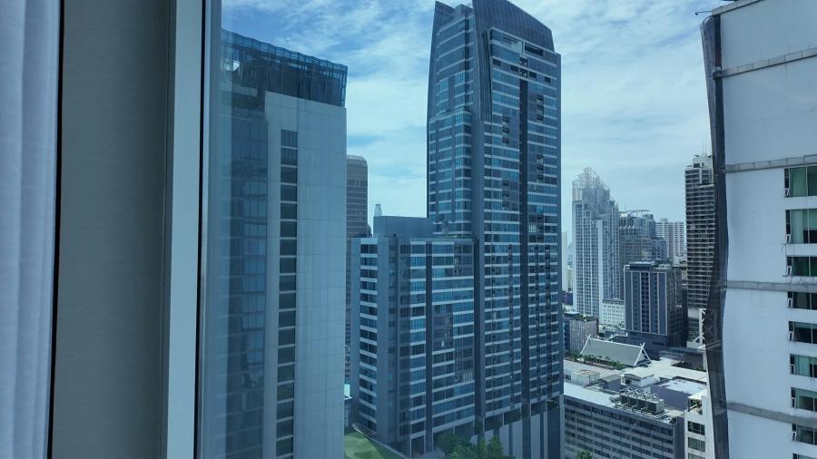 Office and condominium towers along Sukhumvit Road seen from a 23rd floor window at Sofitel Bangkok Sukhumvit.