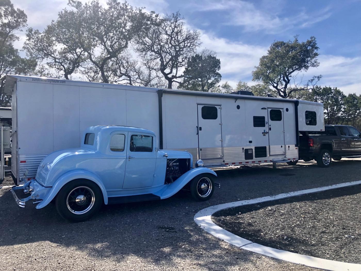 Full-hookup RV sites under shade trees at Wayside Wimberley