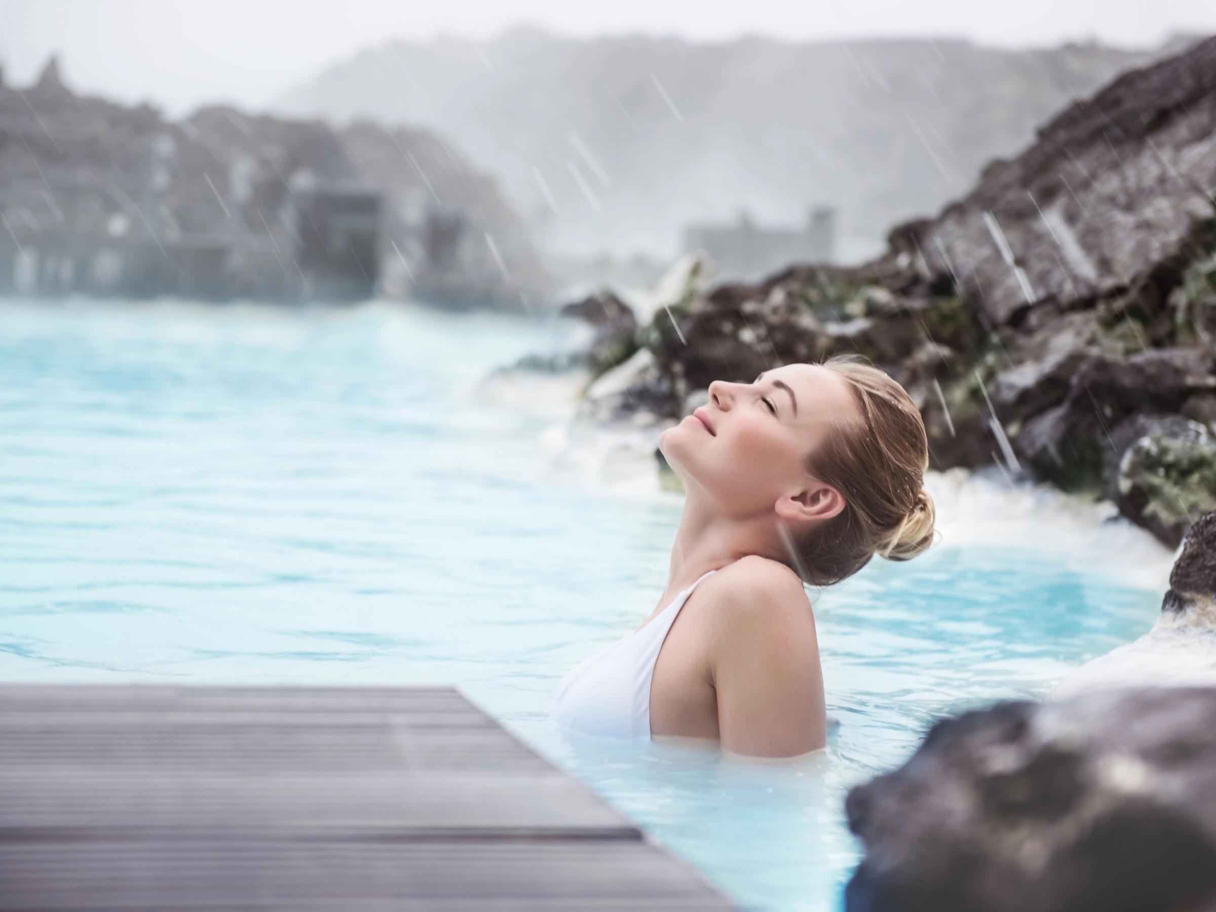 Woman enjoying blue lagoon in Iceland