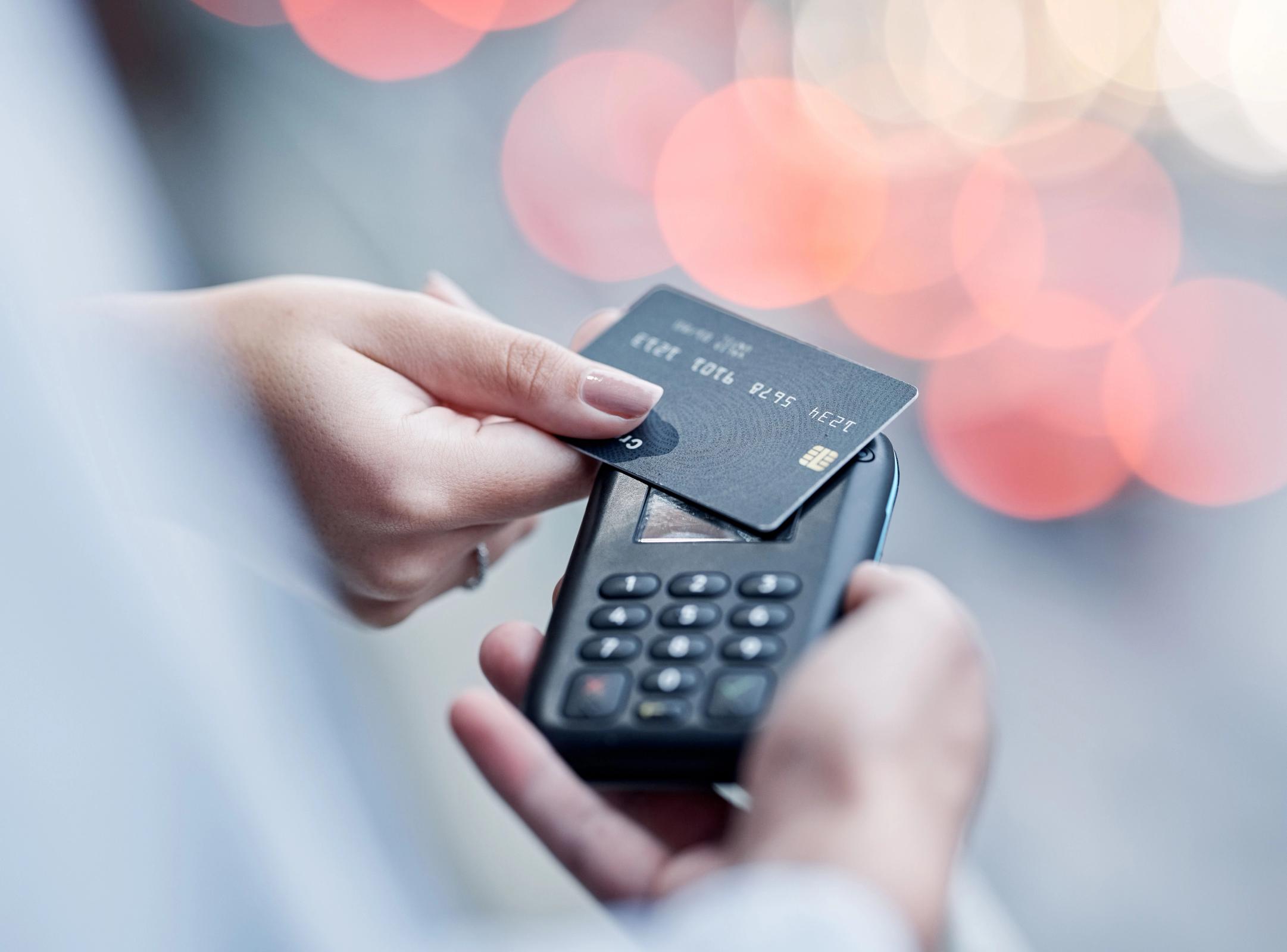 Credit card, pos payment and hands of people, woman or courier delivery man with retail sales machine. Logistics supply chain, shipping distribution and shopping customer with financial fintech tap