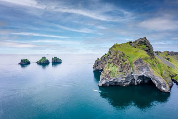 an aerial view of a small island in the middle of the ocean .