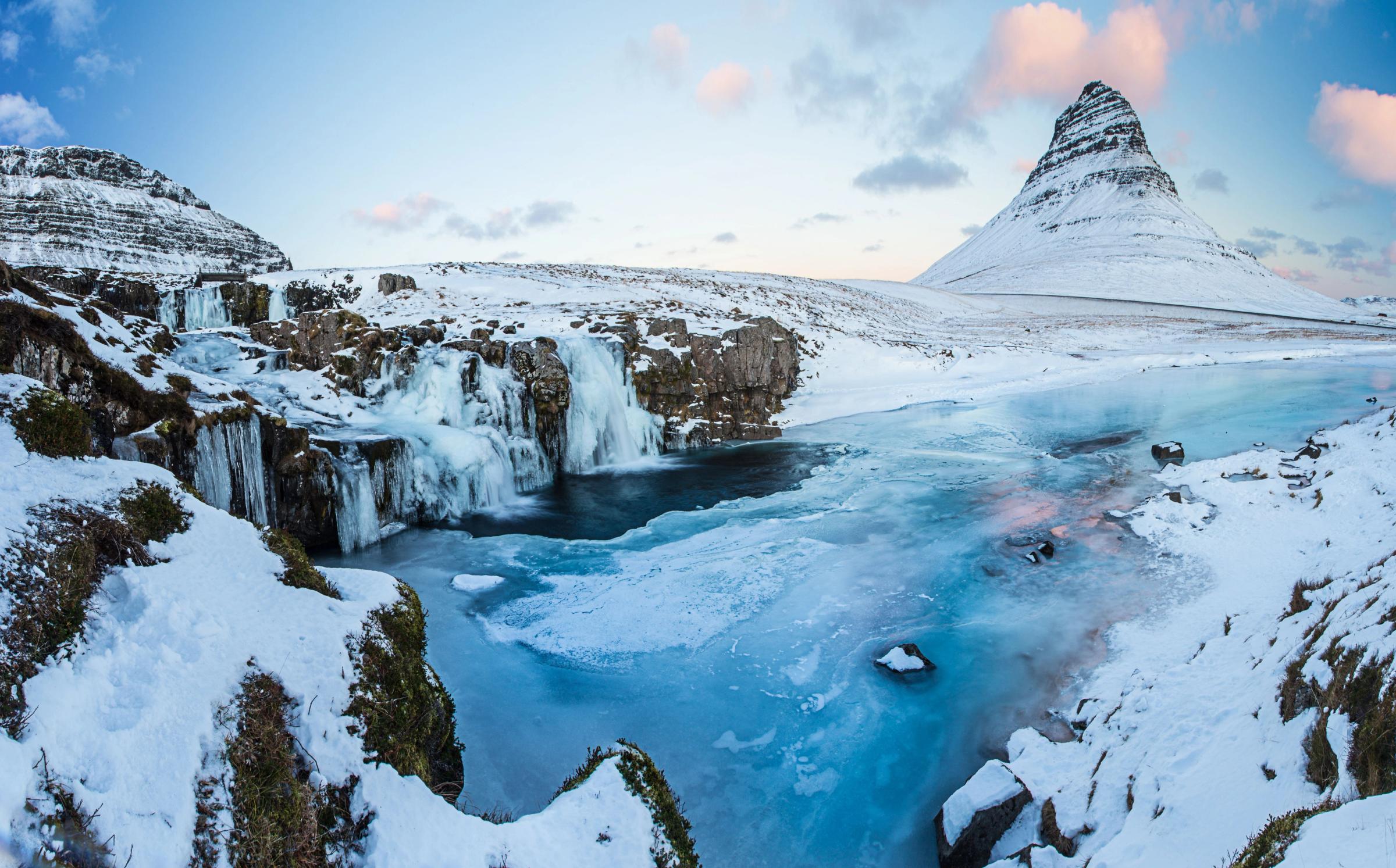 Kirkjufellsfoss and Kirkjufell all covered in snow