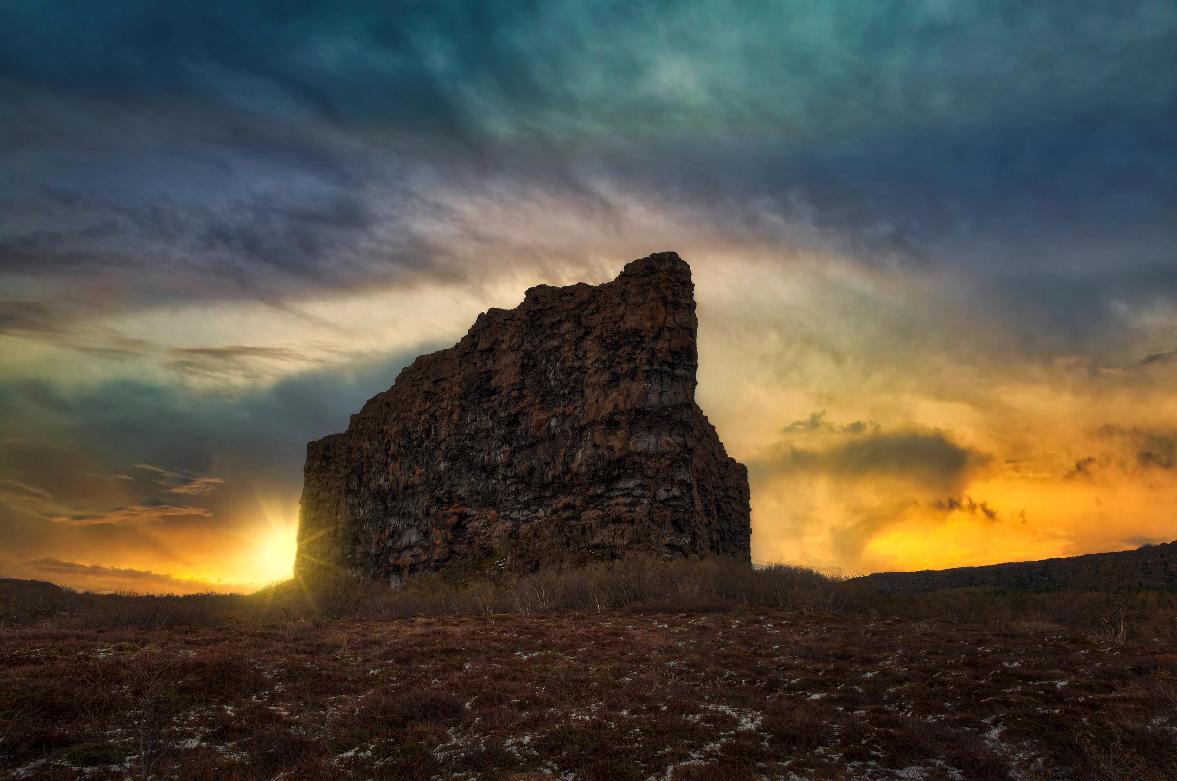Rock formation with the sun behind