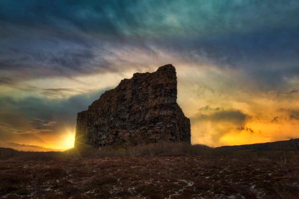 Rock formation with the sun behind