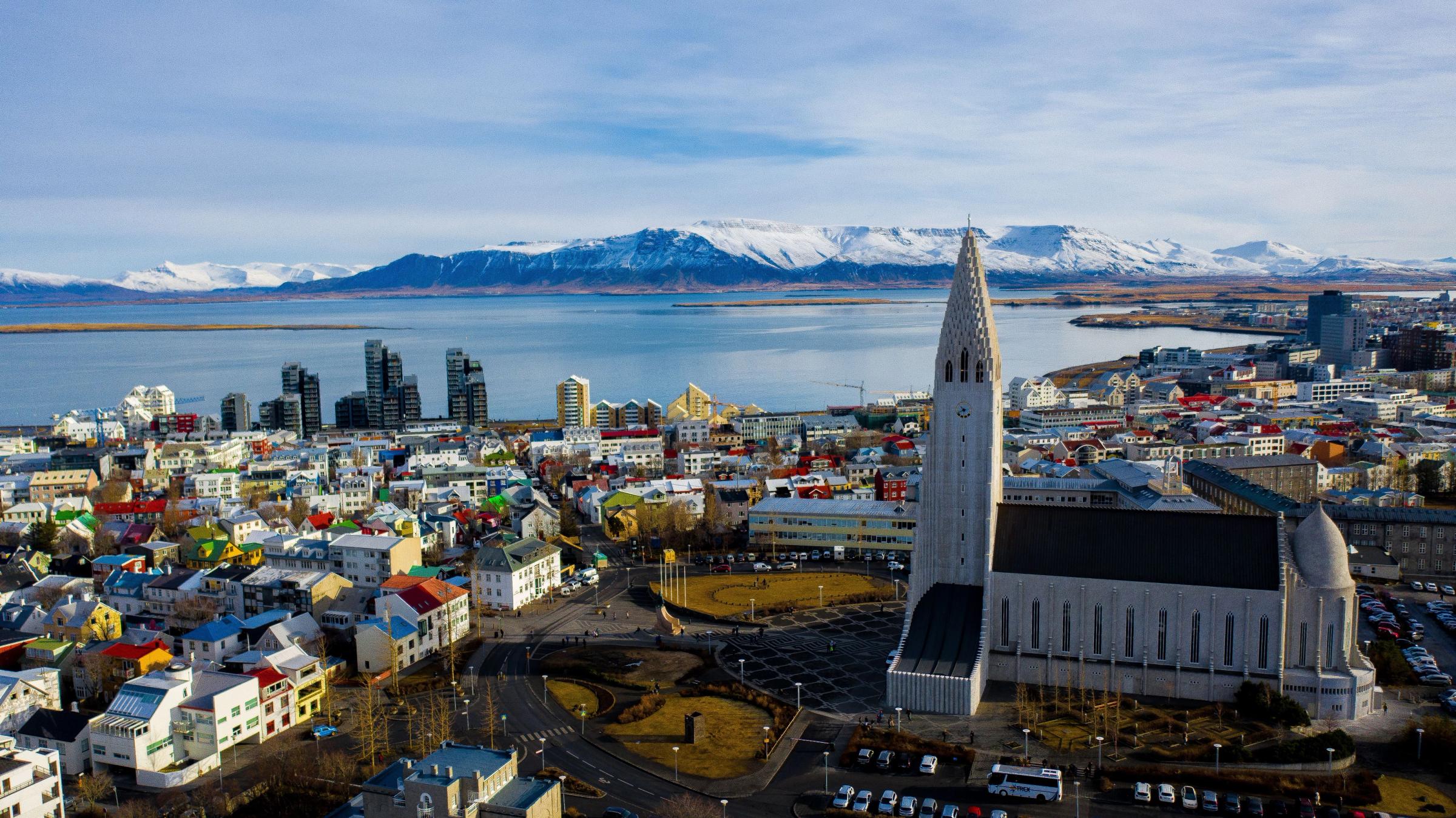 an aerial view of a city with a large church in the middle of it .