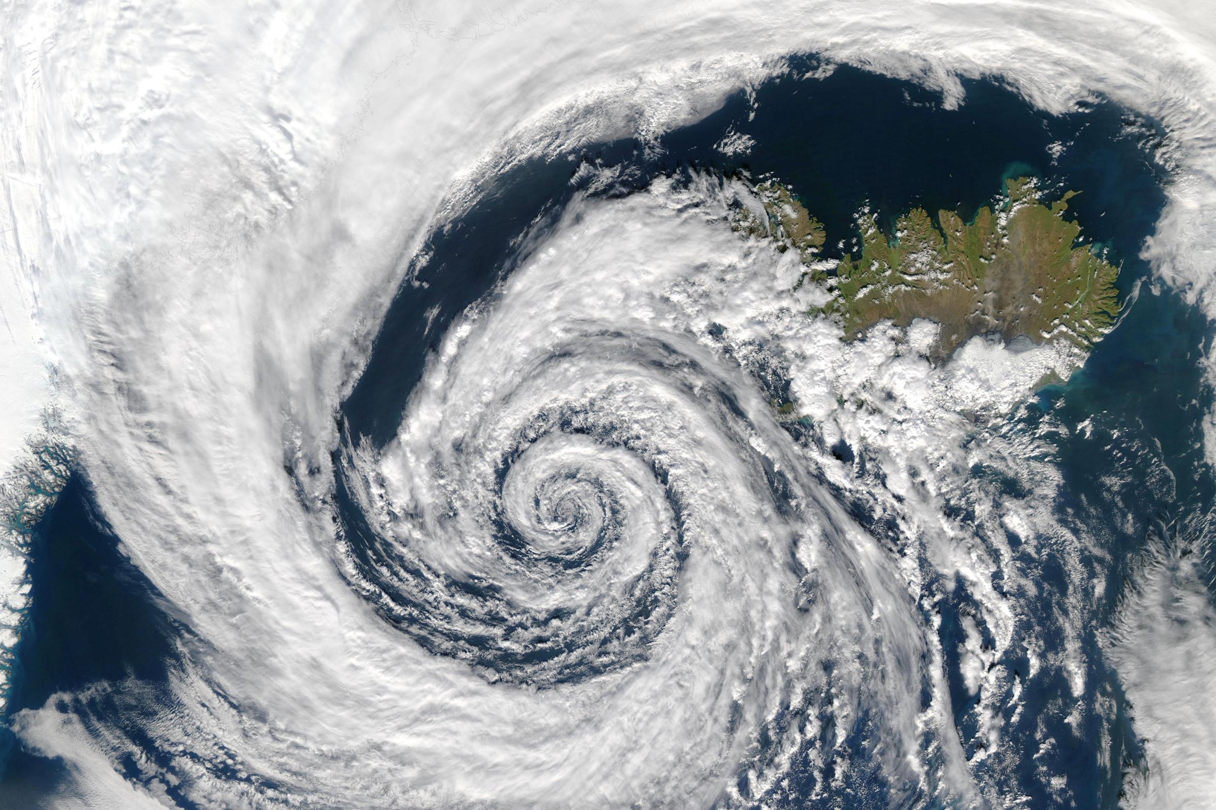 an aerial view of a hurricane in the ocean .