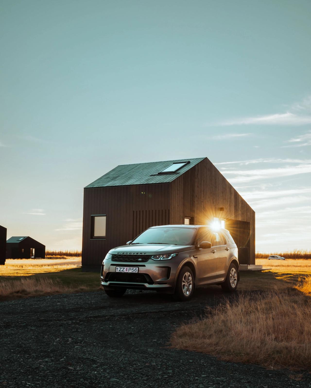Land Rover Discovery Sport parked during Icelandic sunset
