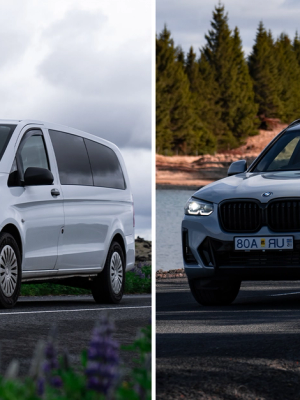 Two rental cars, a minivan on the left and an SUV on the right, parked in scenic Iceland. A minivan rental car on the left and a SUV rental car on the right in Iceland.