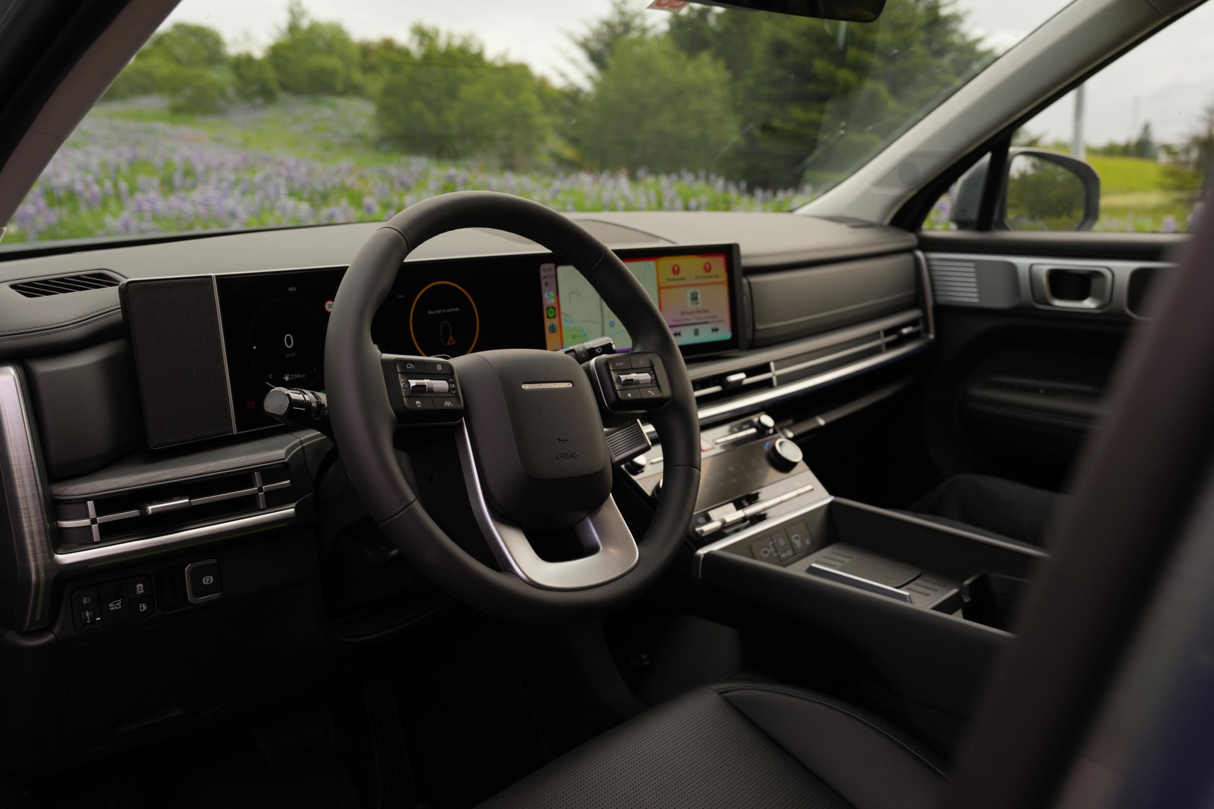 Hyundai Santa Fe dashboard with steering wheel, digital driver display and centre touchscreen
