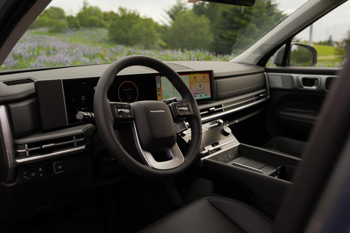 Hyundai Santa Fe dashboard with steering wheel, digital driver display and centre touchscreen