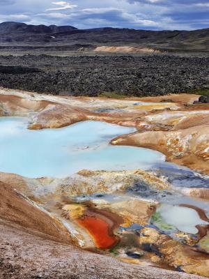 there is a large pool of water in the middle of the desert .