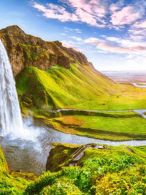 Seljalandsfoss waterfall in Iceland Seljalandsfoss waterfall in Iceland during sunny day.