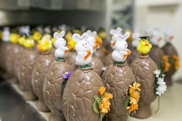 a row of chocolate easter eggs with bunny figurines on top of them Icelandic easter eggs