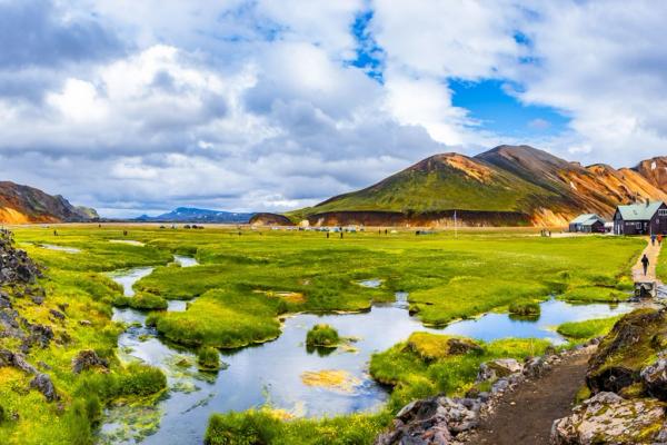 The beautiful Landmannalaugar Hot Springs An arial view of a geothermal pool, also known as hot springs in iceland located in a green steam valley