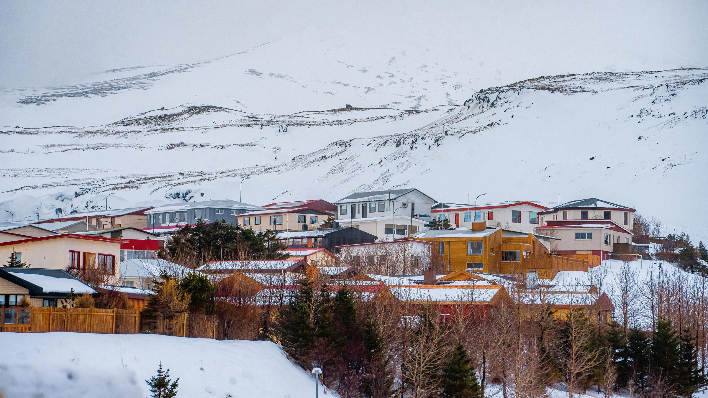 Houses surrounded by snow in Ólafsvík