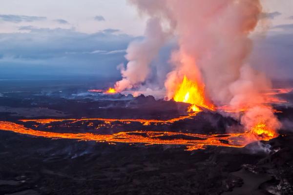 Aerial view of an erupting volcano