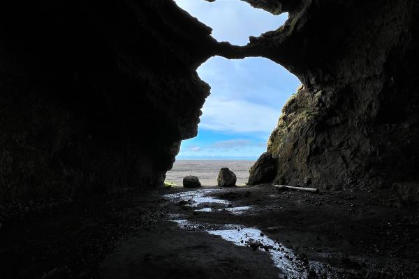 view of the entrance of a cave resembling Yoda from Stars Wars