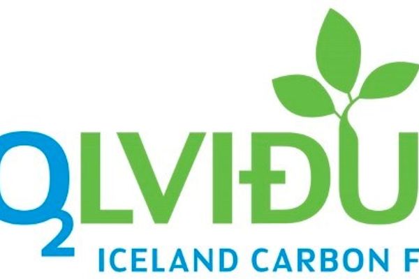 the logo for the iceland carbon fund has a plant growing out of it .