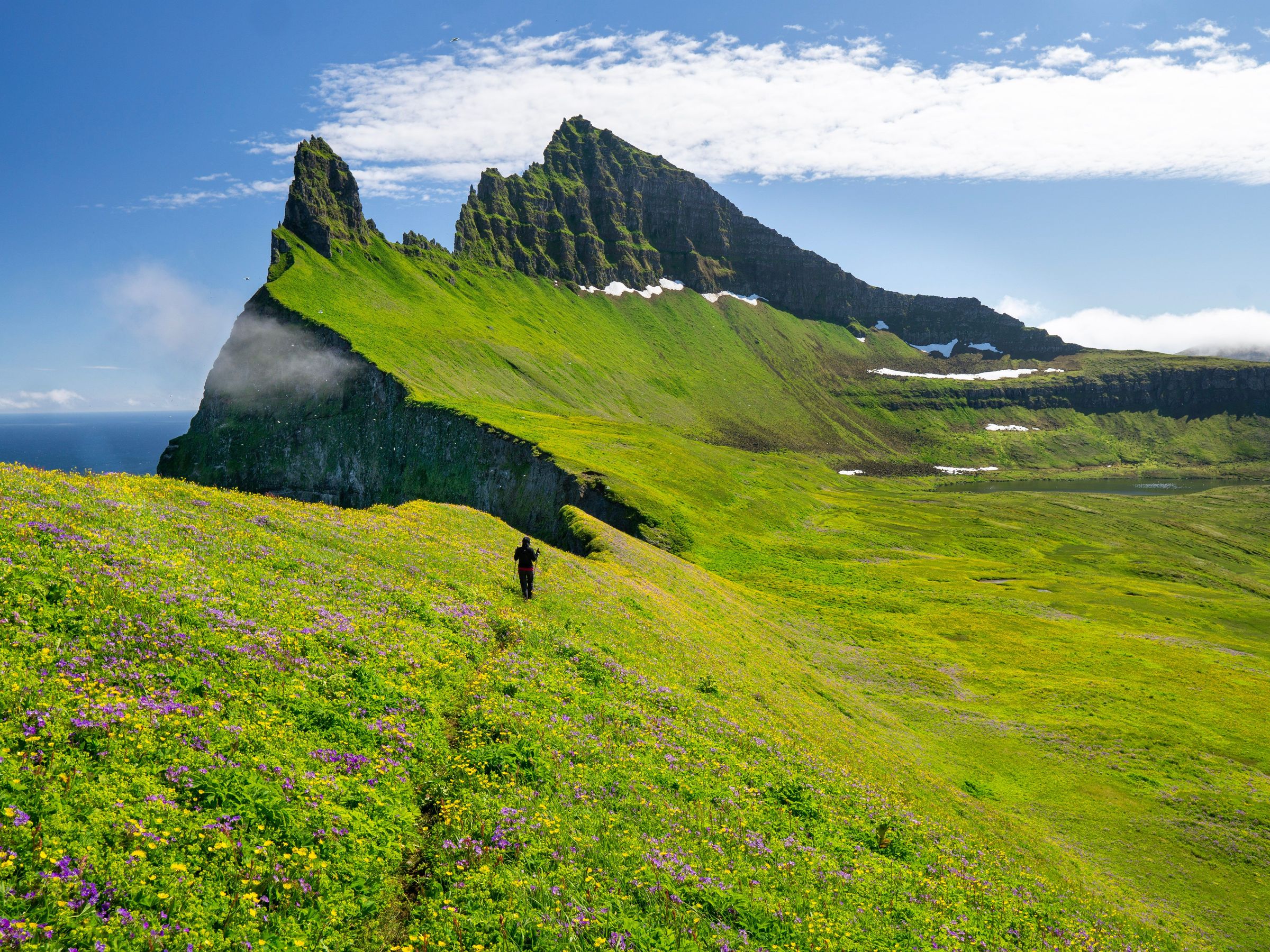Girl walking in the Hornstrandir Peninsula, Westfjords of Iceland