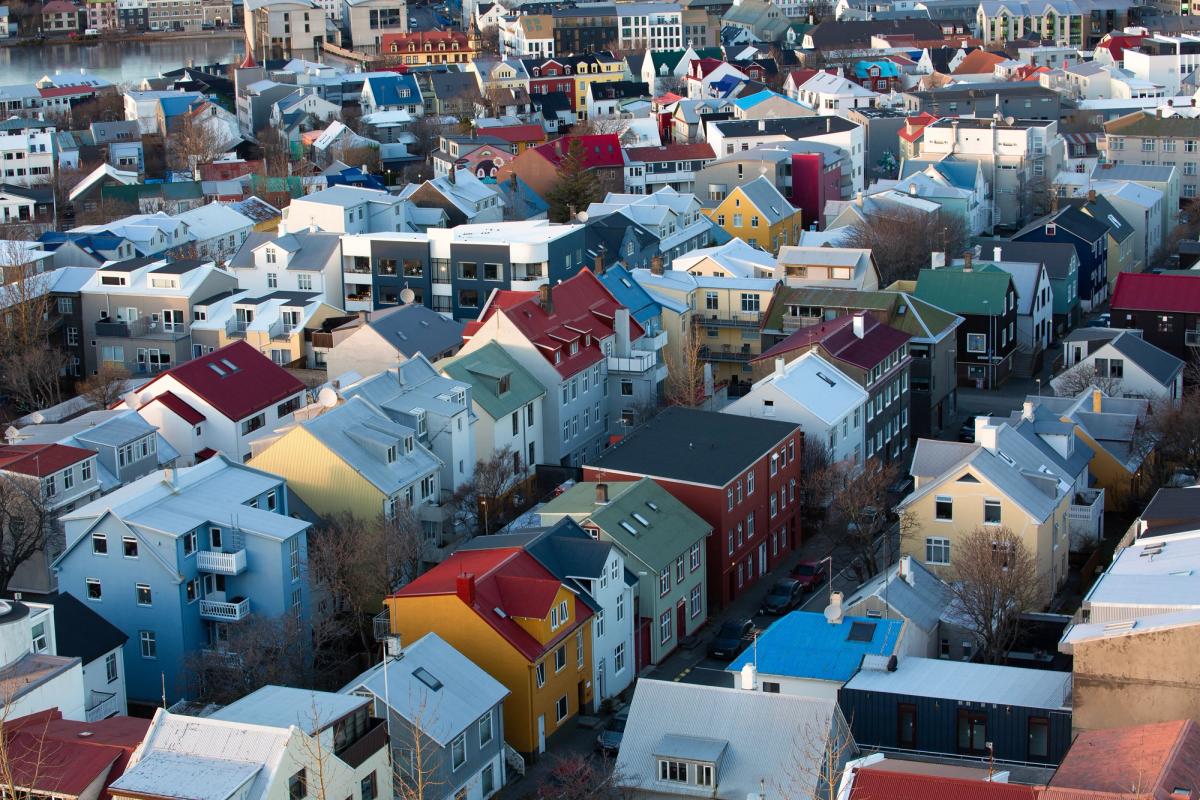 an aerial view of Reykajvik with lots of colorful houses .