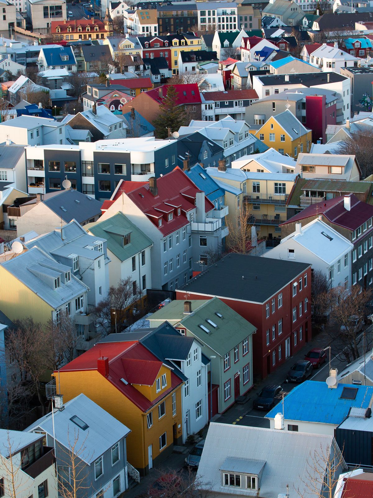 an aerial view of Reykajvik with lots of colorful houses .