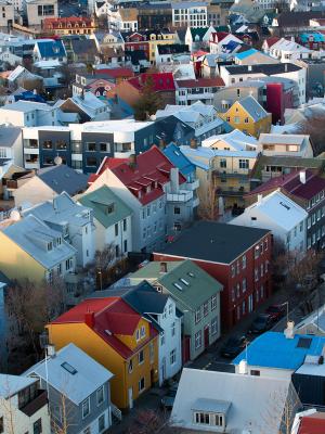 an aerial view of Reykajvik with lots of colorful houses .