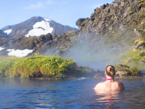 Woman bathing in the Landmannalaugar hot springs