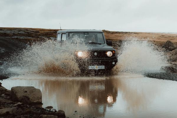 F road in Iceland Suzuki Jimny river crossing in F-road in Iceland