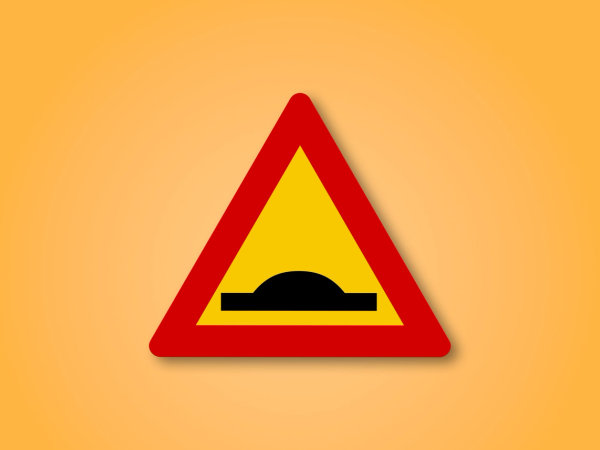 a yellow and red triangle with a black bump in the middle