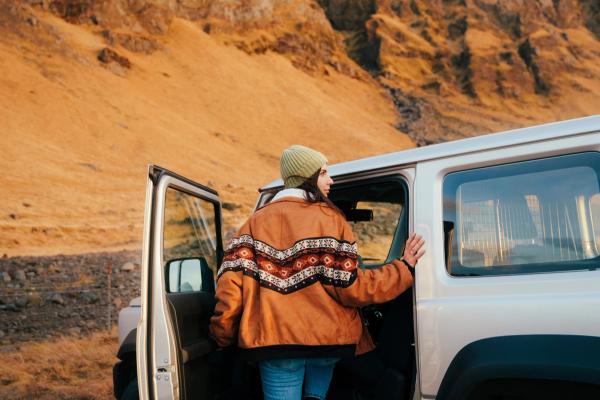 Woman going for a drive in iceland during the summer